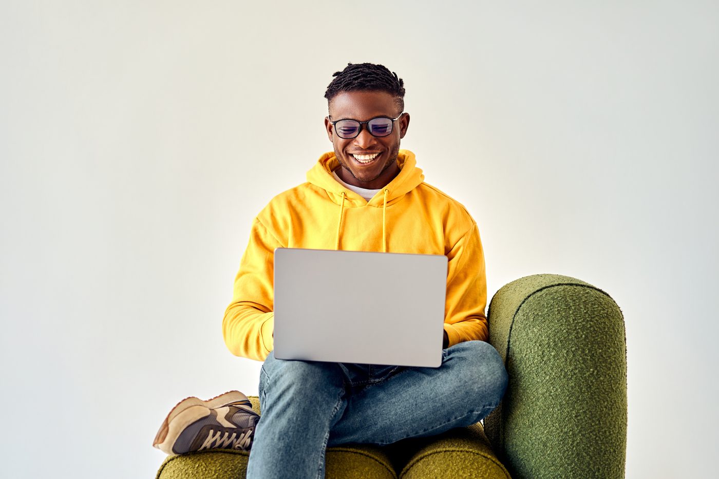 Club member wearing a printed hoodie ordering from an online shop